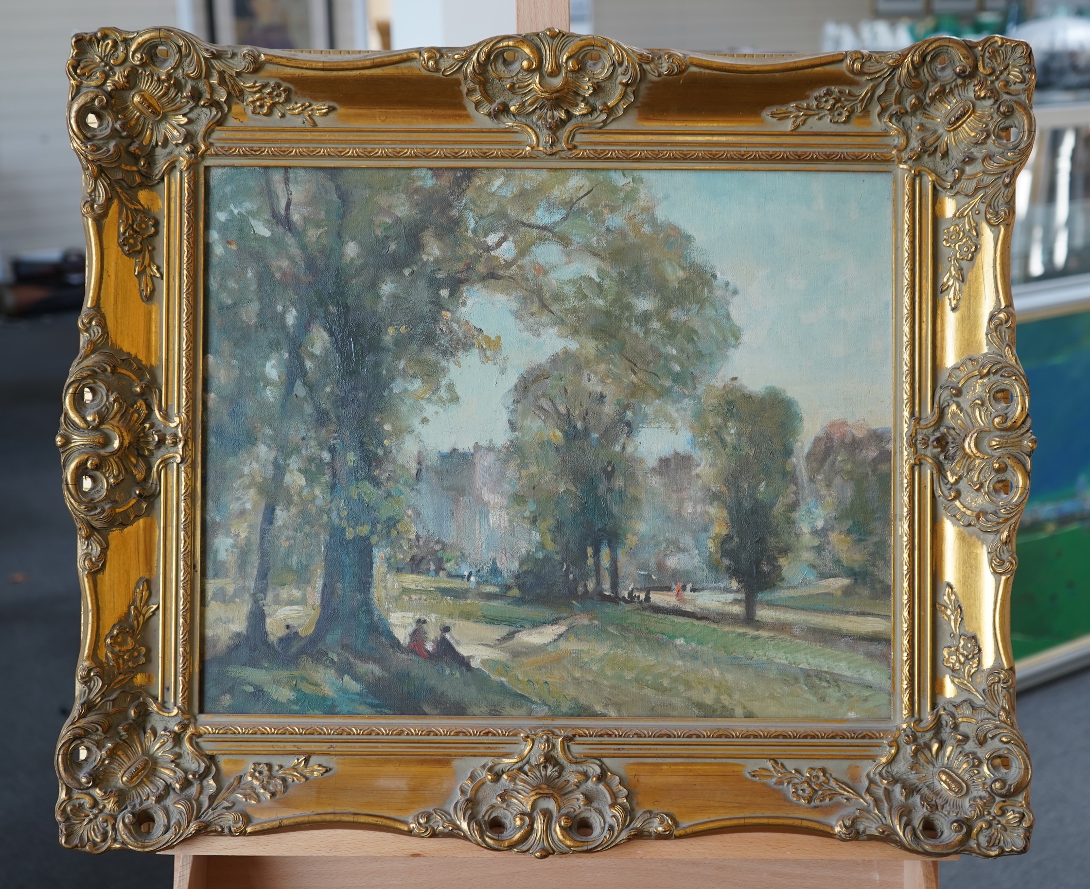 Follower of Edward Seago RBA, ARWS, RWS (1910-1974), Parkland scene with figures, a building in the background, unsigned, oil on canvas, ornate gilt framed, 39 x 49cm